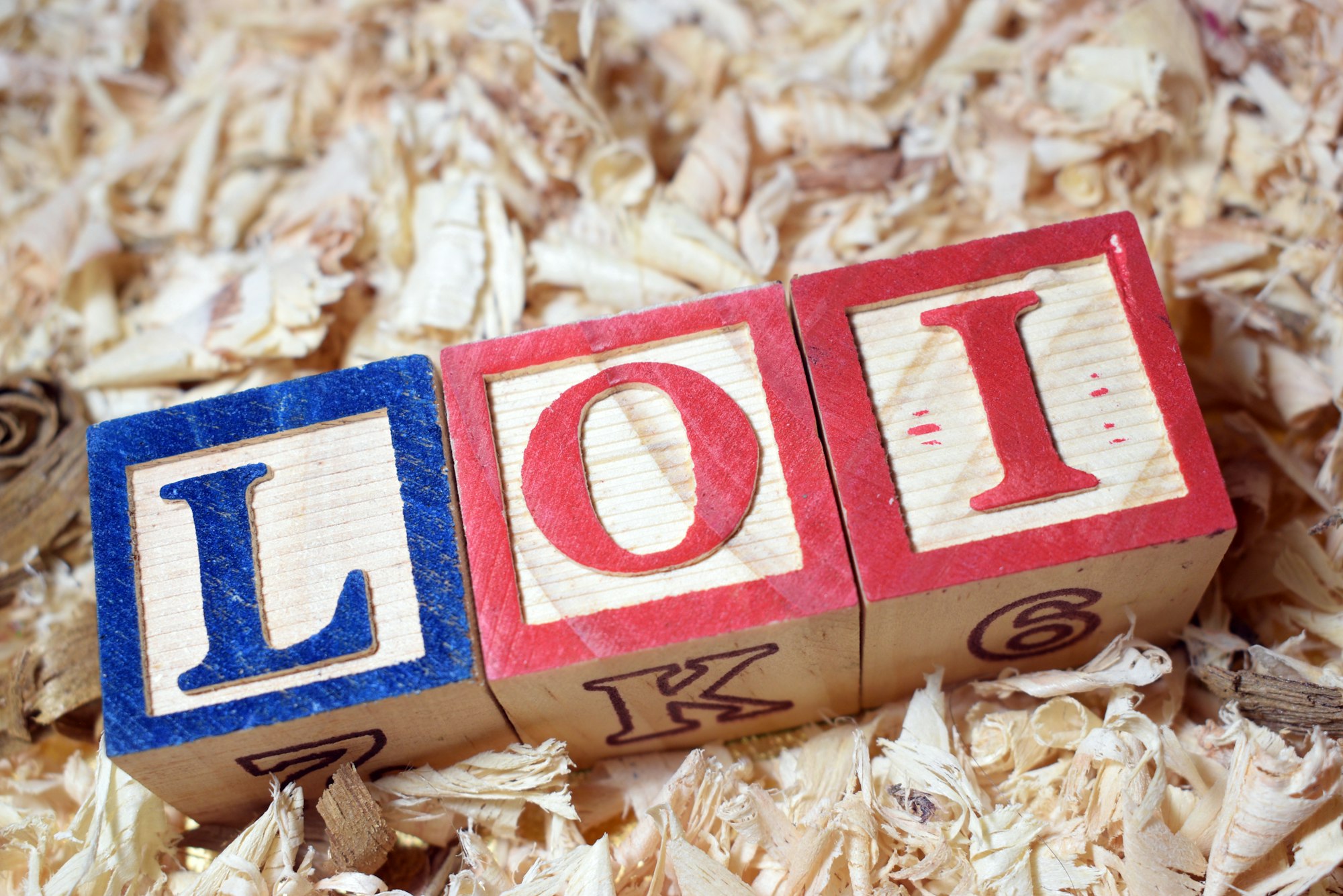 Letter Of Intent (LOI) acronym arranged with wooden blocks