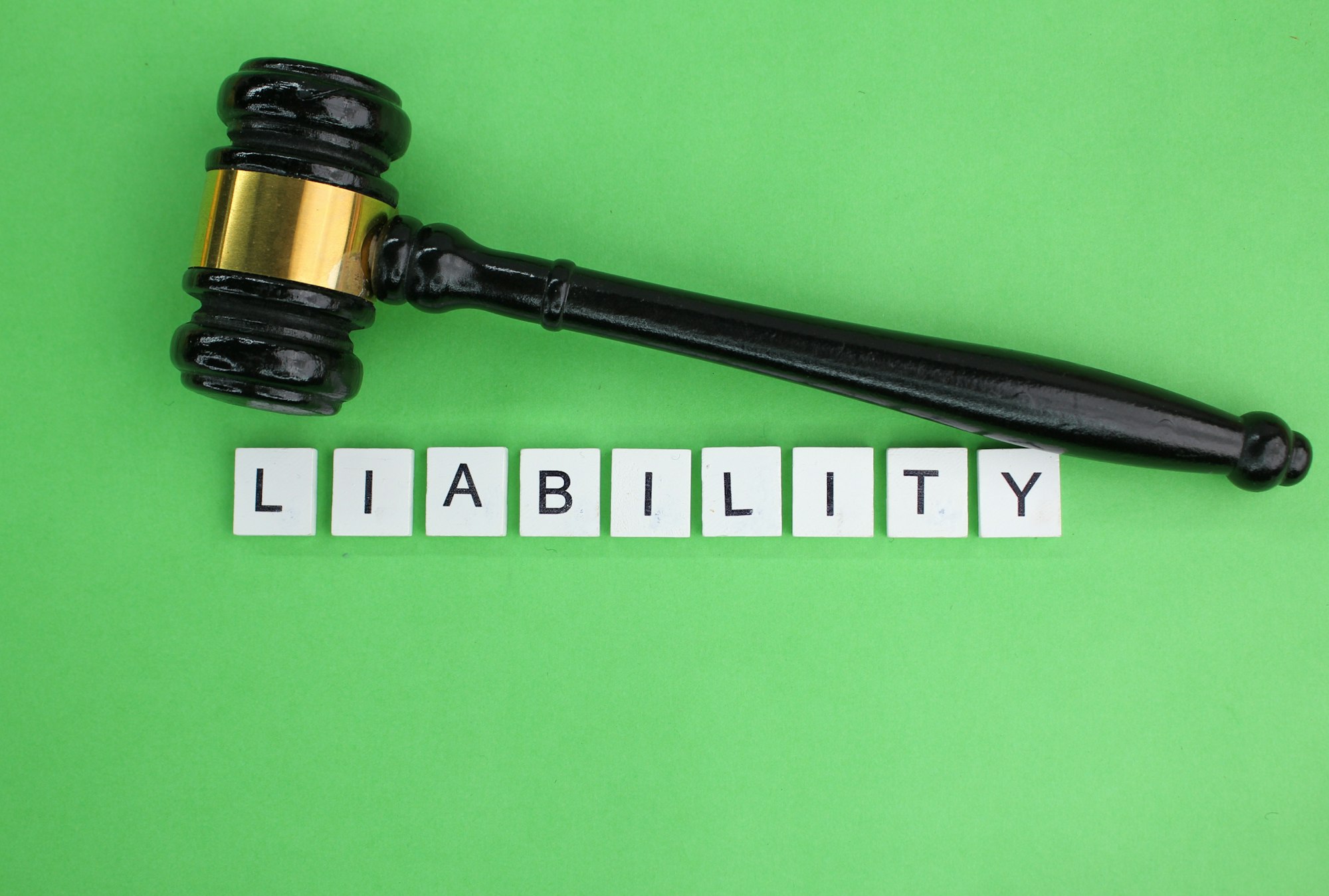 letters of the alphabet with the word liability. concept of liability.