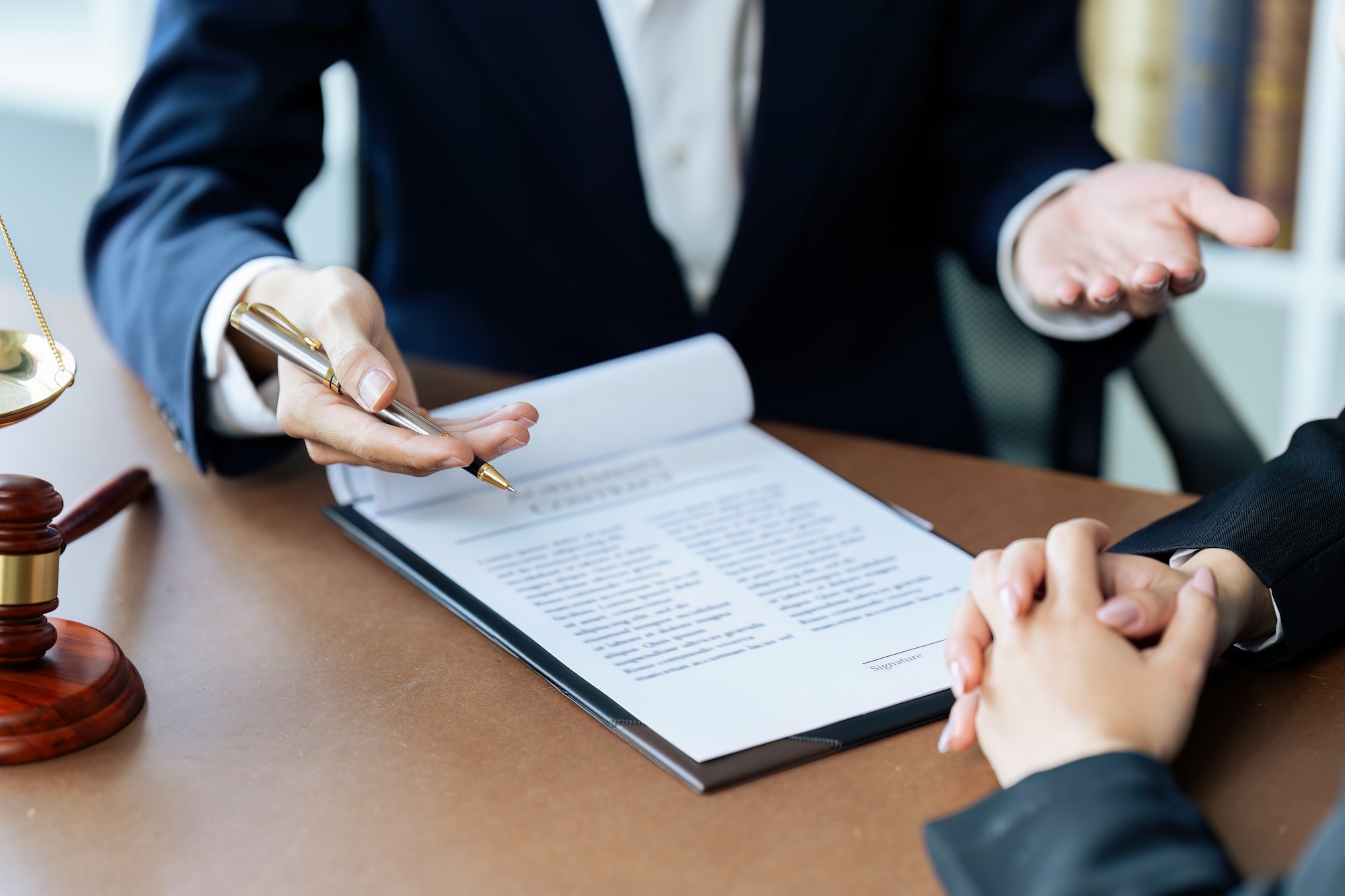 Businessman and lawyer discuss the contract document. Treaty of the law. Sign a contract business